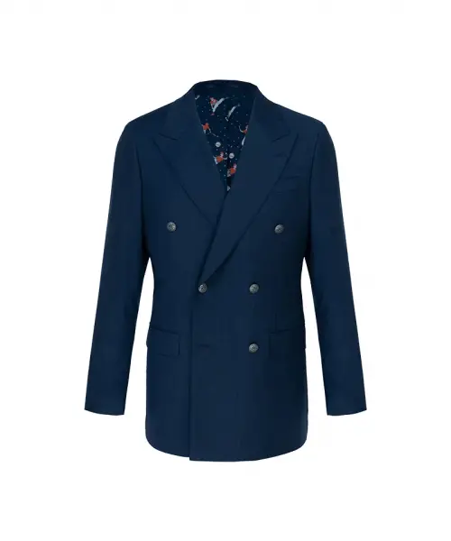 Veste croisée bleu marine sur fond blanc, six boutons, revers classiques et doublure intérieure à motif discret.